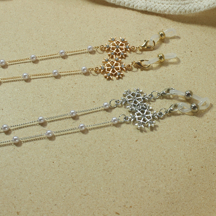 Elegant glasses holder chain with pearls and snowflake pendant Kalsten