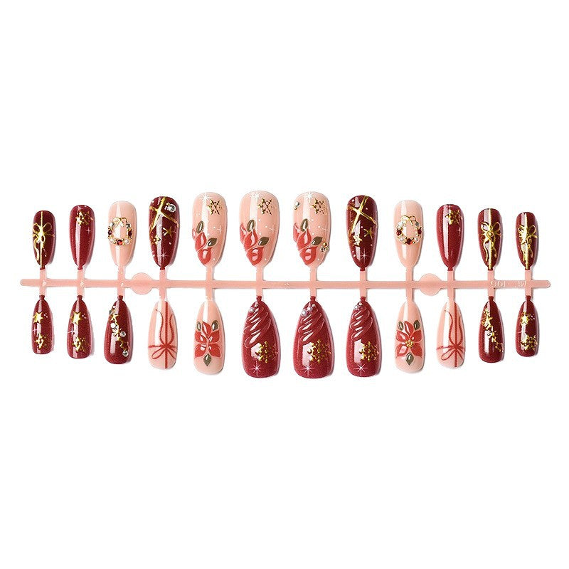 Artificial nail set with luxurious Christmas designs and glamorous accents Kalsten