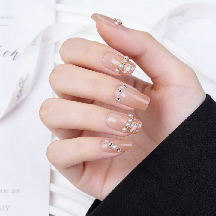 Artificial nails with elegant pearl and glitter decorations Kalsten