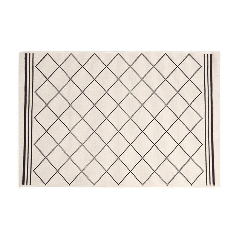 Flat-woven runner rug with diamond pattern and easy-care texture
