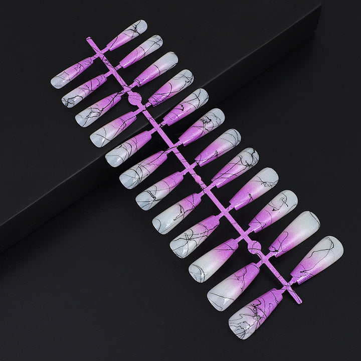 Artificial nails in modern ombre design with marbled accents Kalsten