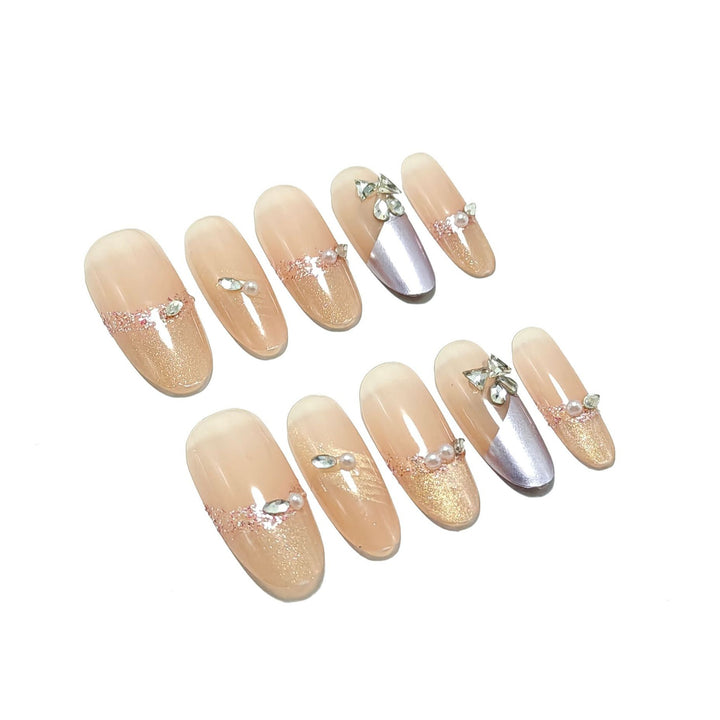 Glamorous artificial nails with rhinestone applications Kalsten