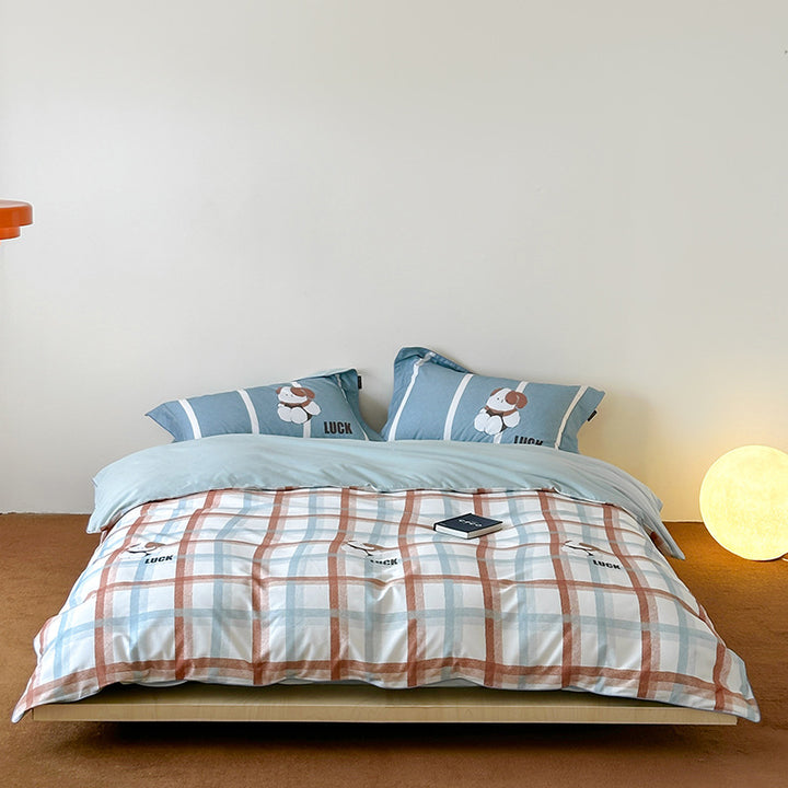 Reversible cotton bedding set with playful sheep print and soft jersey finish