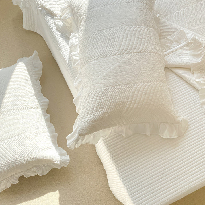 Quilted bedspread set with ruffle and embossed leaf quilting
