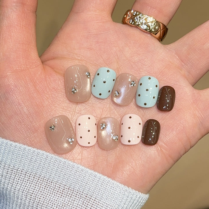 Acrylic nails with rhinestones and glitter Kalsten
