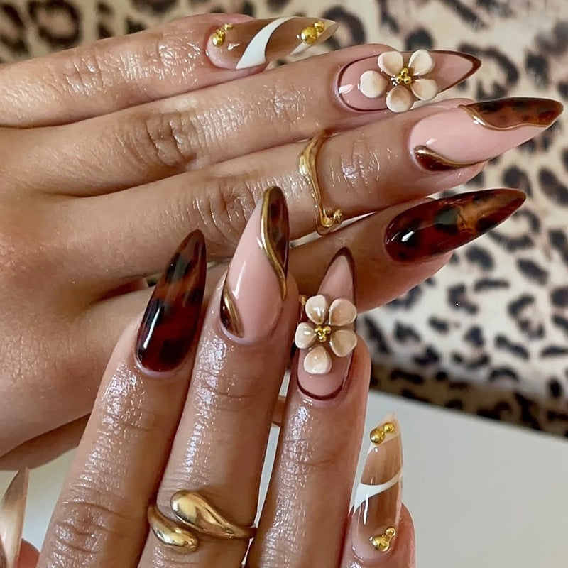 Nail art set with floral accents and elegant designs Kalsten
