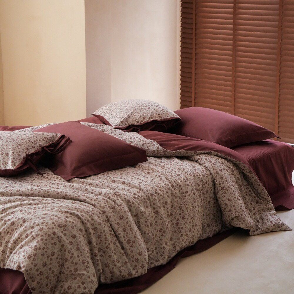 Luxurious bedding set with floral microprint percale and satin finish back