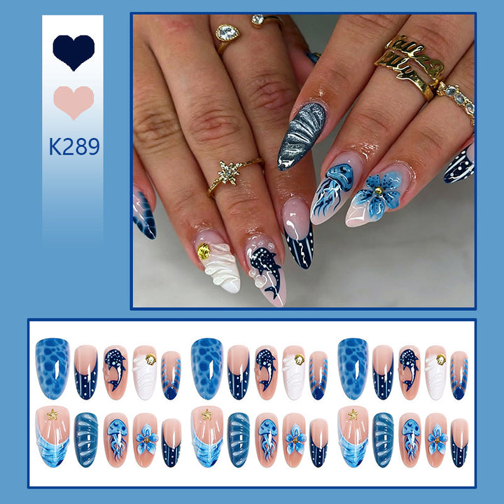 Artificial nails with maritime design and 3D flower accents Kalsten