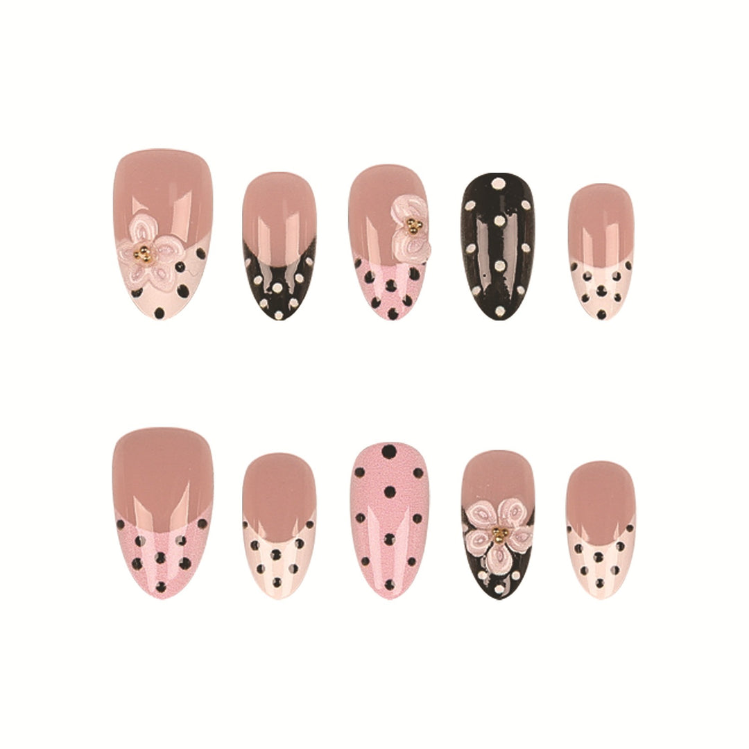 Artistic Press-On Nail Set Featuring Floral and Polka Dot Designs