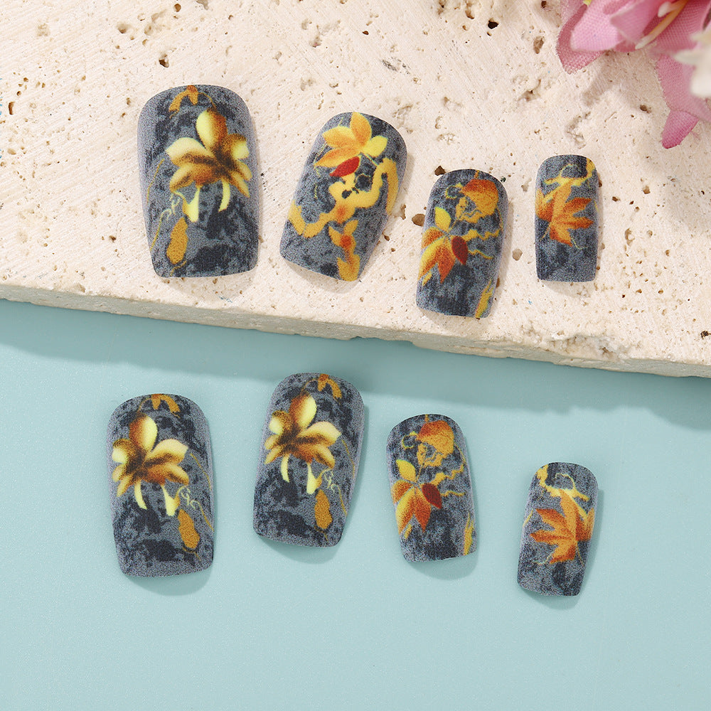 Artificial nails with colorful flower designs Kalsten