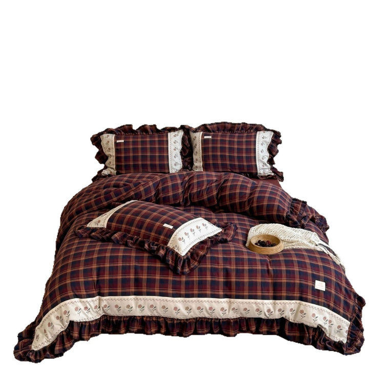 Checked bedding set in vintage cottage style with ruffle and embroidered border
