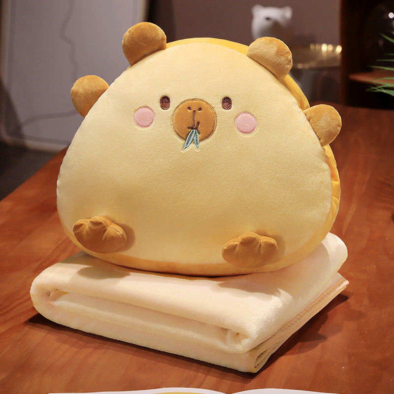 Plush cuddle pillow with integrated microfiber throw blanket in cute animal design