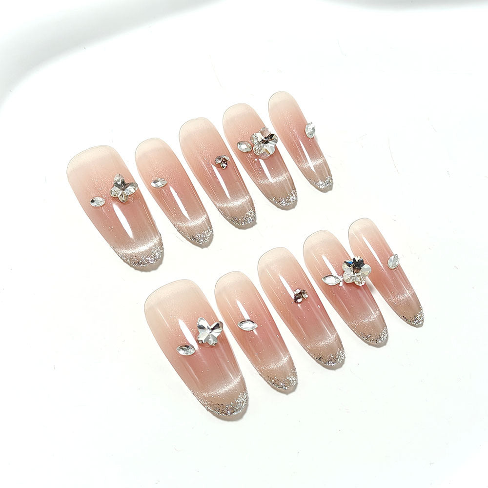 Glamorous artificial nails with glitter decorations Kalsten