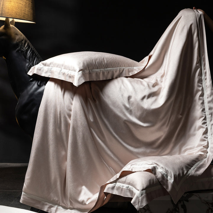 Luxurious satin bedding set with contrasting decorative trim