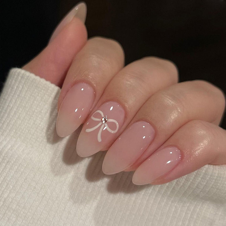 Artful Nail Extensions with Bow Decoration Kalsten