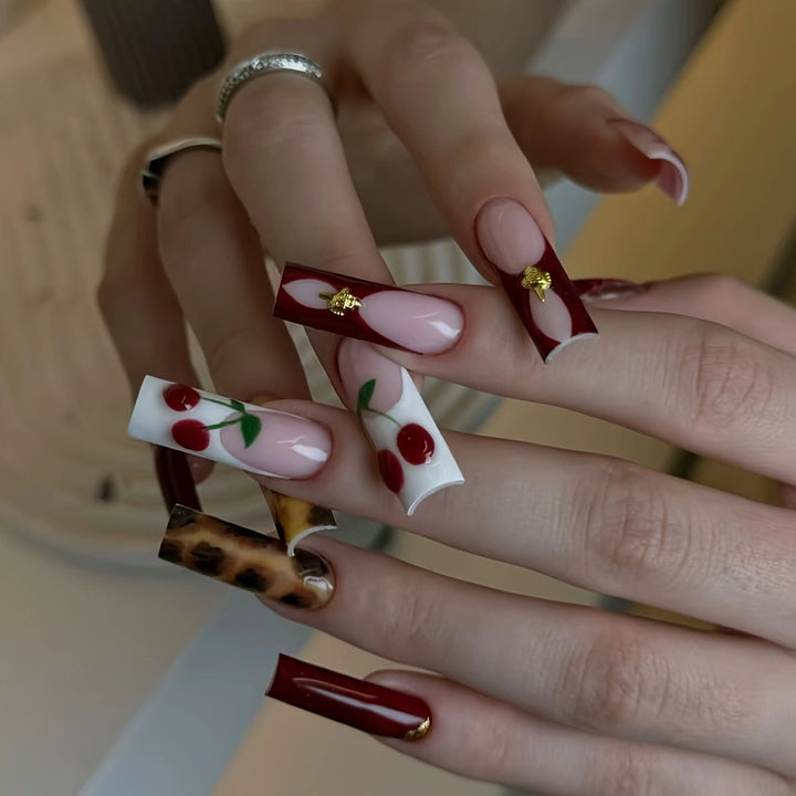 Artistic Cherry-Themed Nail Enhancements Kalsten