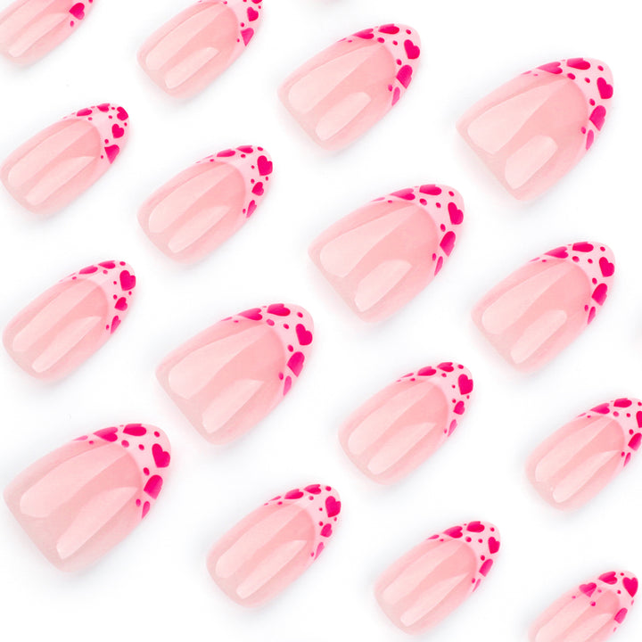 Artificial nail extensions with heart tip accents Kalsten