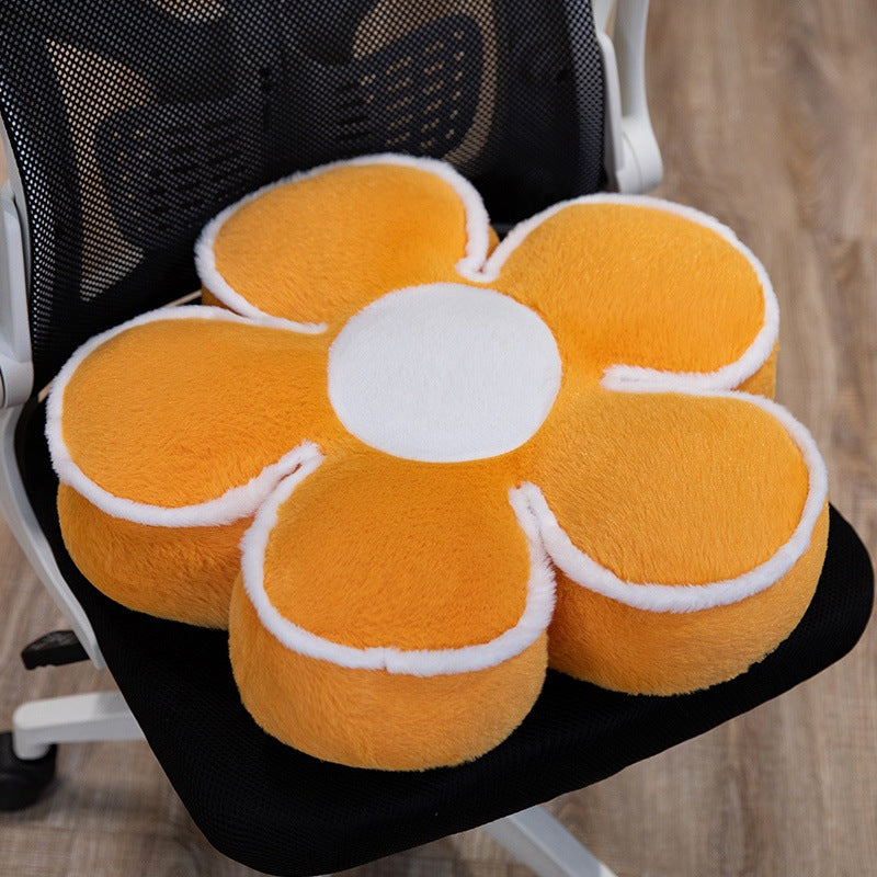 Padded seat cushion in flower shape with faux leather center piece and fluffy edge padding