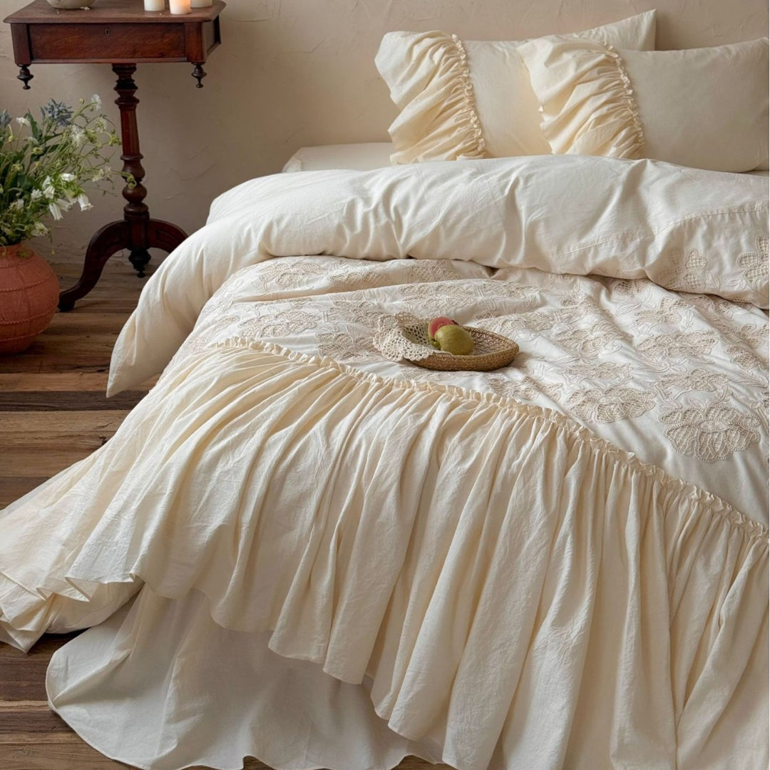 Vintage bedding set with ruffled bed skirt and embroidered bedspread
