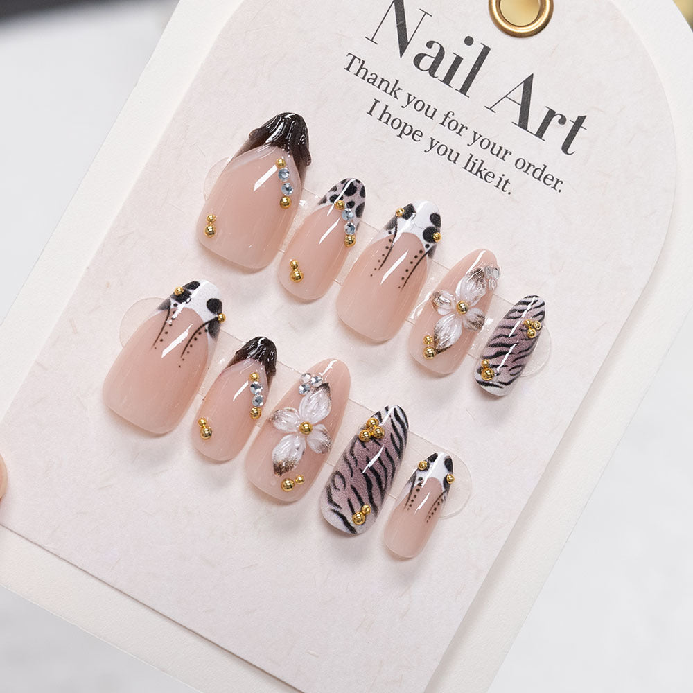 Artistic Nail Art Set with Floral and Animal Print Design