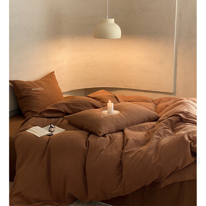 Bedding set made of cotton muslin with quilted all-season blanket
