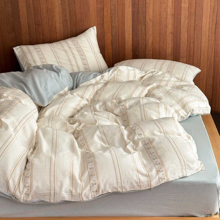 Reversible cotton bedding set with fine stripe and ethnic pattern