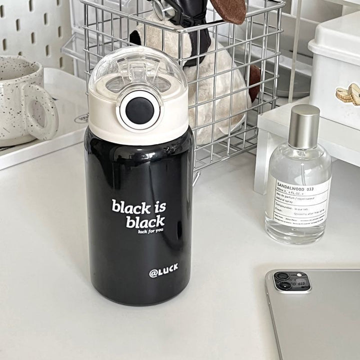 Women's insulated drinking bottle with innovative flip lid and practical handle Kalsten