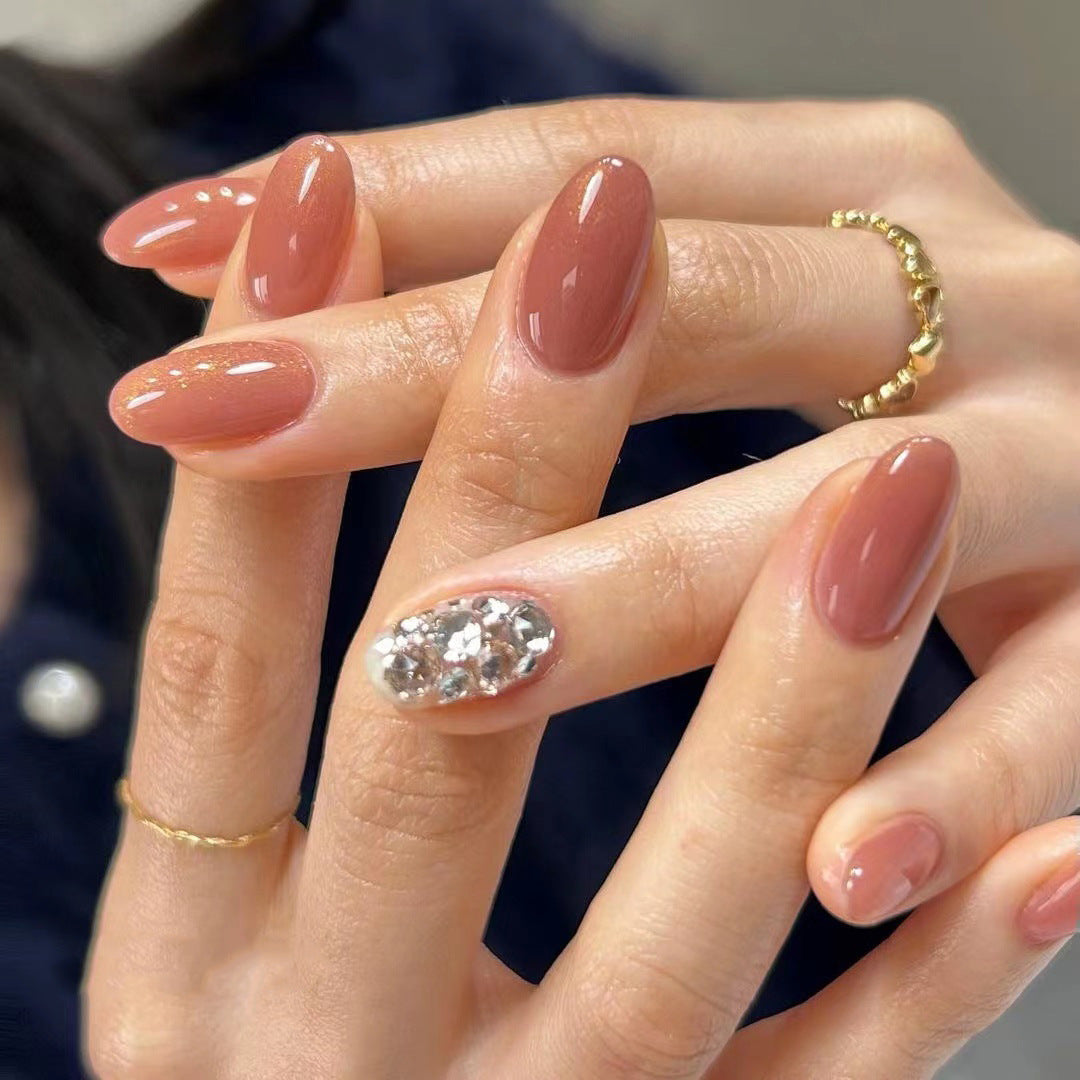 Artistic acrylic nails with glitter accents Kalsten