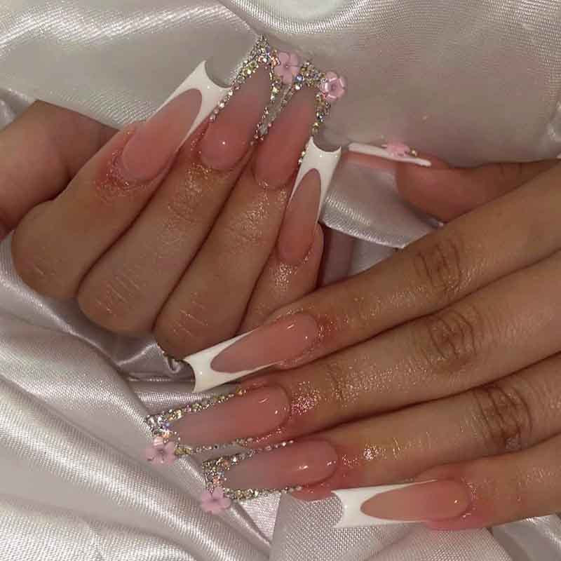 Art nail set with elegant glitter and floral accents Kalsten