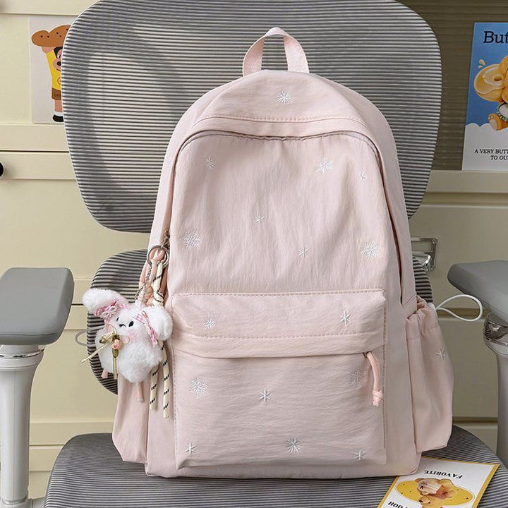 Playful backpack with fine embroidery Kalsten