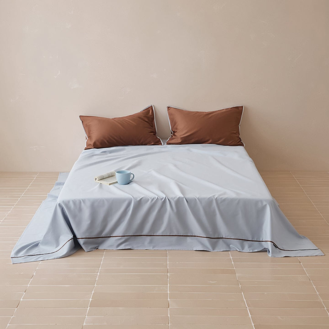 Noble cotton satin bed sheet and pillowcase set with fine piping