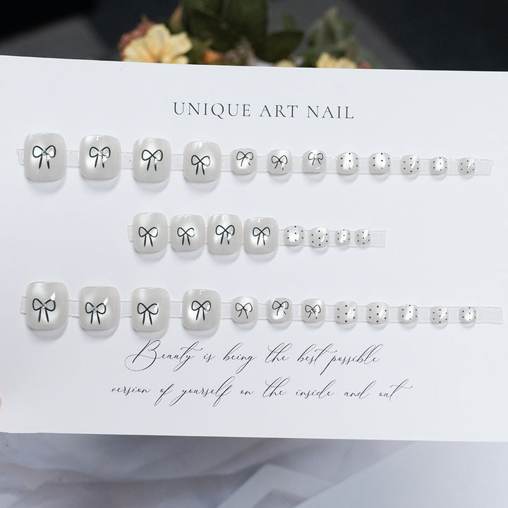 Decorative Bow-Accented Toenail Art