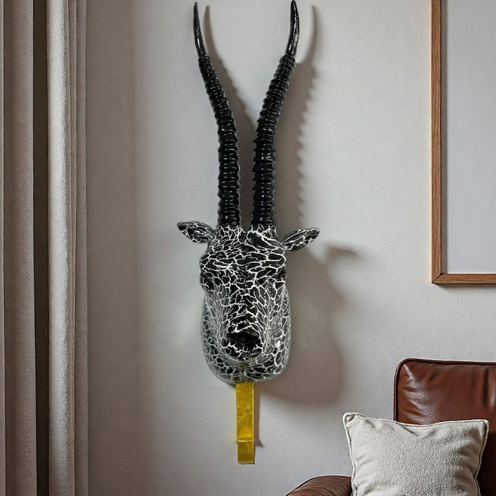 Wall hooks in the shape of a stylized unicorn Kalsten