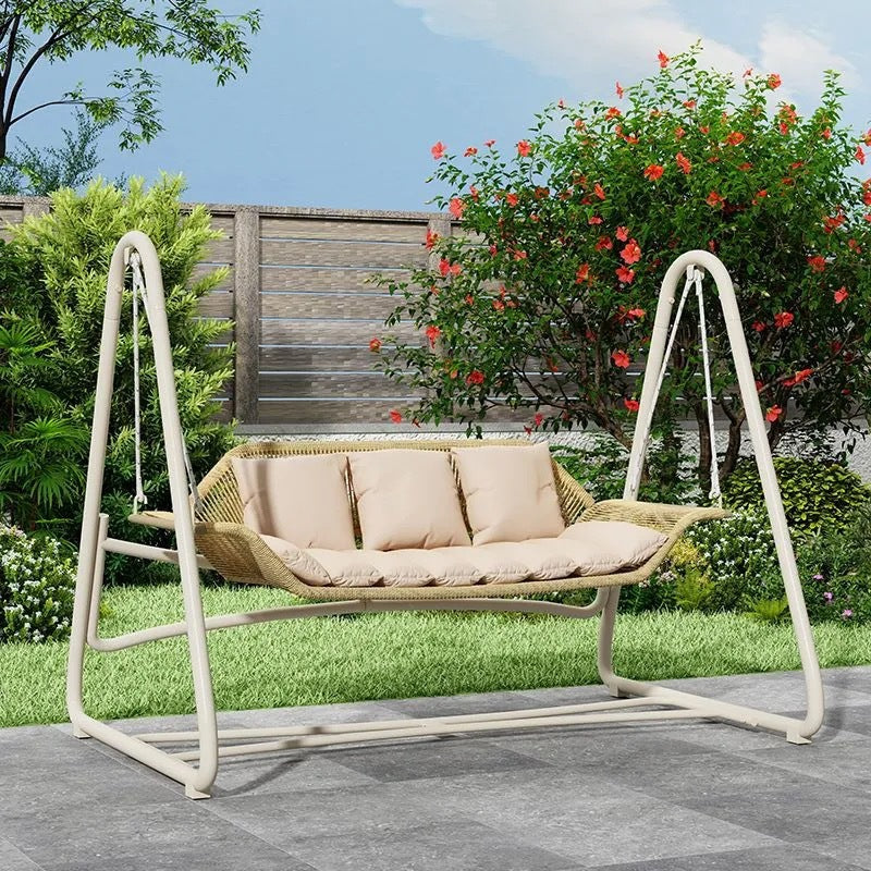 Woven rattan outdoor swing loveseat with padded cushions and powder-coated steel frame Kalsten