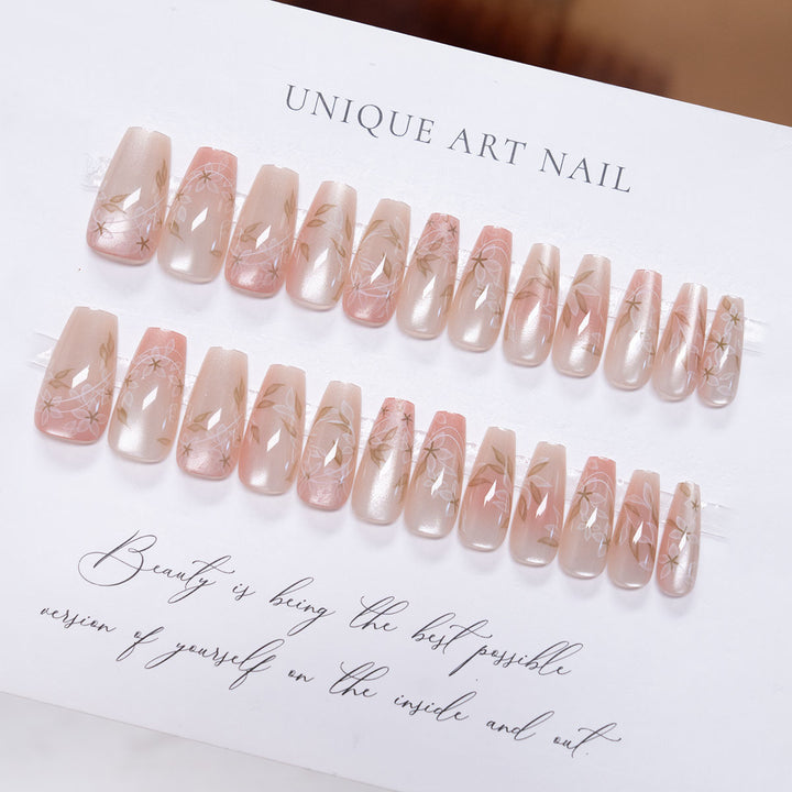 Elegant Press-On Nail Art with Floral Detail