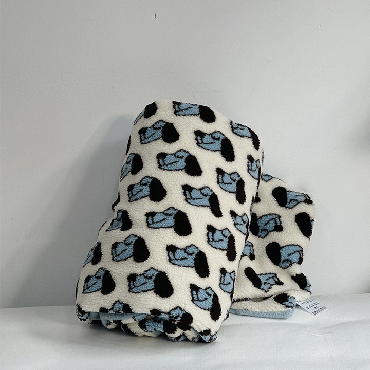 Plush Sherpa throw blanket with abstract pattern and extra-soft teddy fleece
