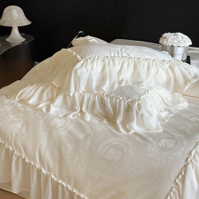 Bedding set in vintage ruffled style made of cotton satin with jacquard medallion and frill