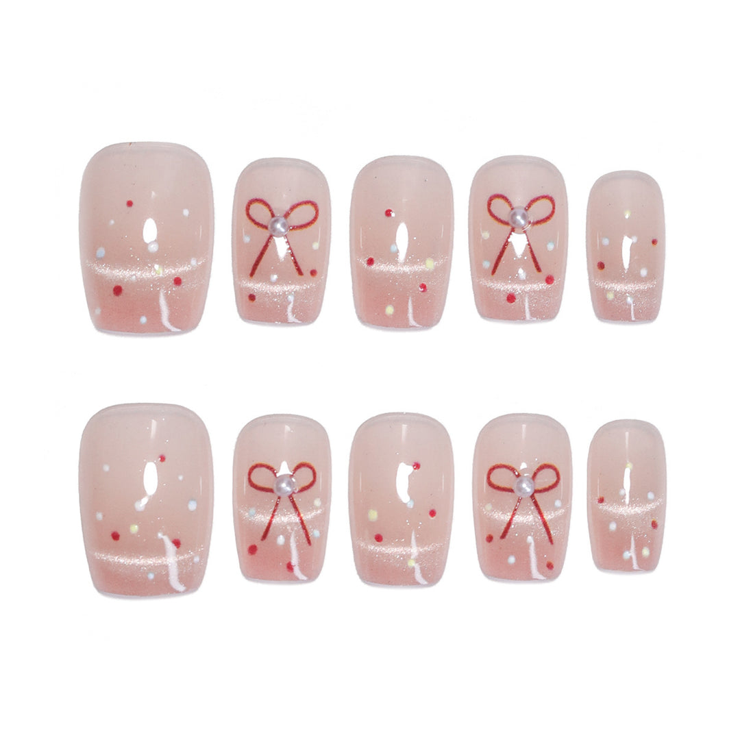 Artificial nail art with elegant bows and glitter accents Kalsten