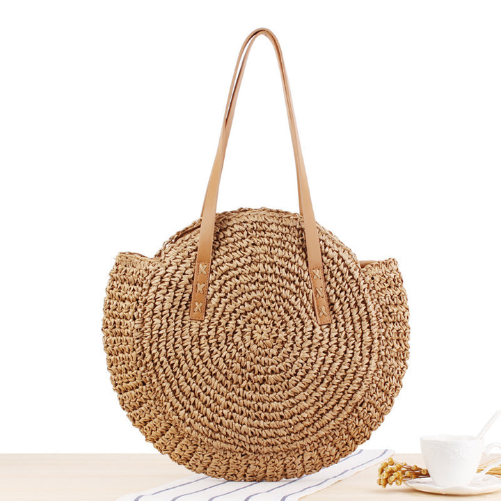 Round straw bag with leather handles Kalsten