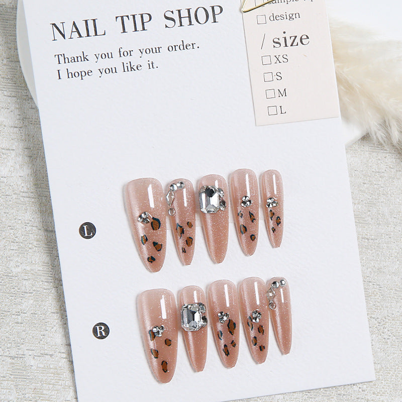 Glamorous artificial nail set with fun leopard pattern and glittering accents Kalsten