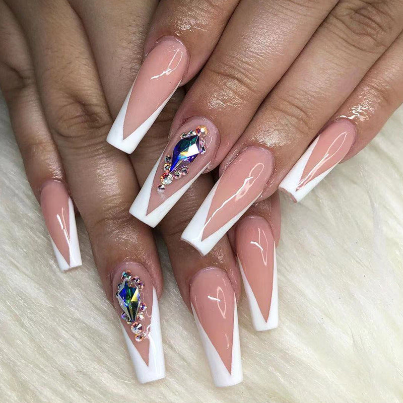 Artful nail extensions with elegant glitter accents Kalsten