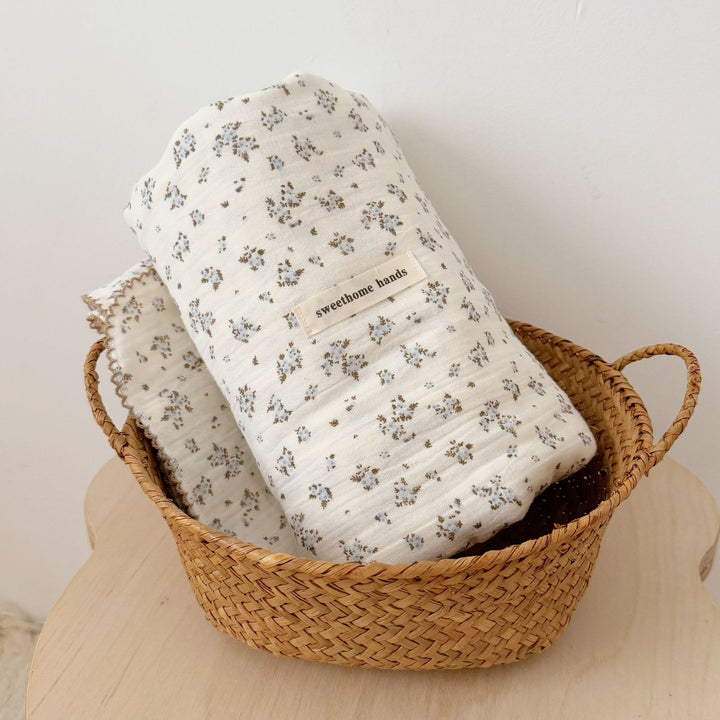 Unisex Muslin Blanket with delicate floral design and elegant ruffles Kalsten