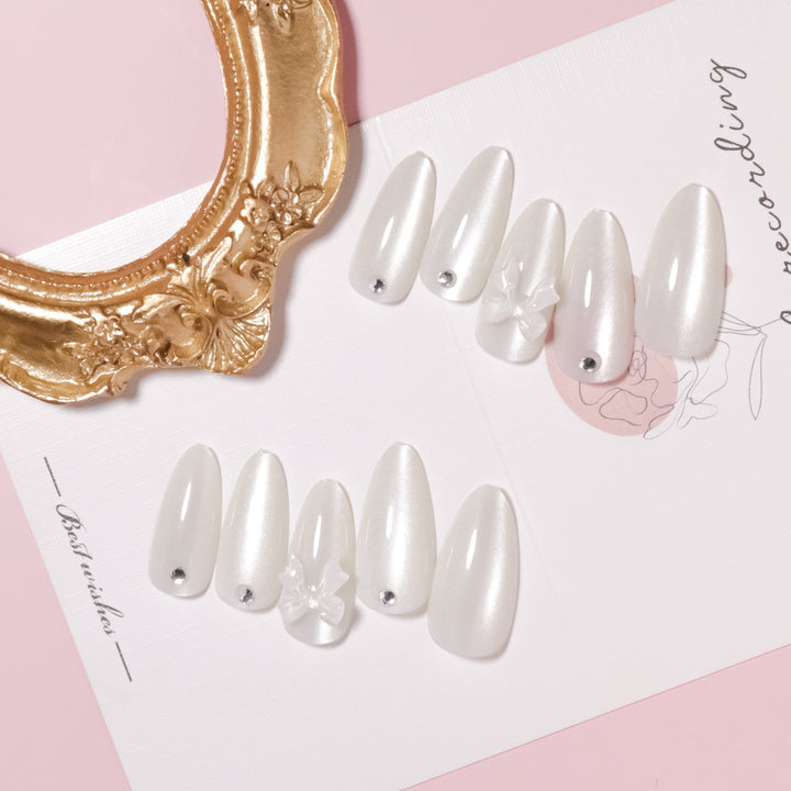 Elegant Stiletto-Shaped Press-On Nails with Decorative Bow Accents Kalsten