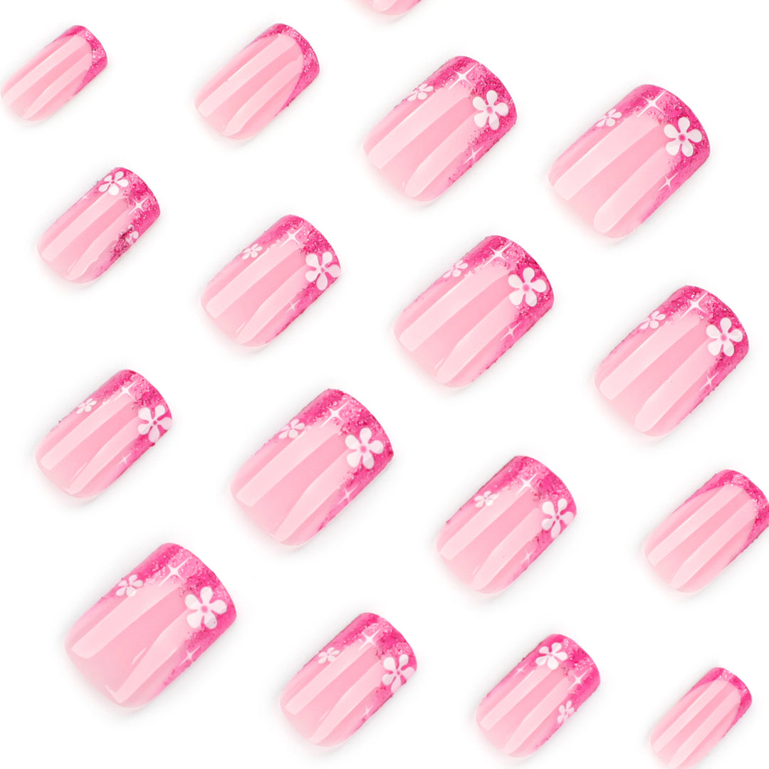 Artistic nail art with floral accent and glitter Kalsten