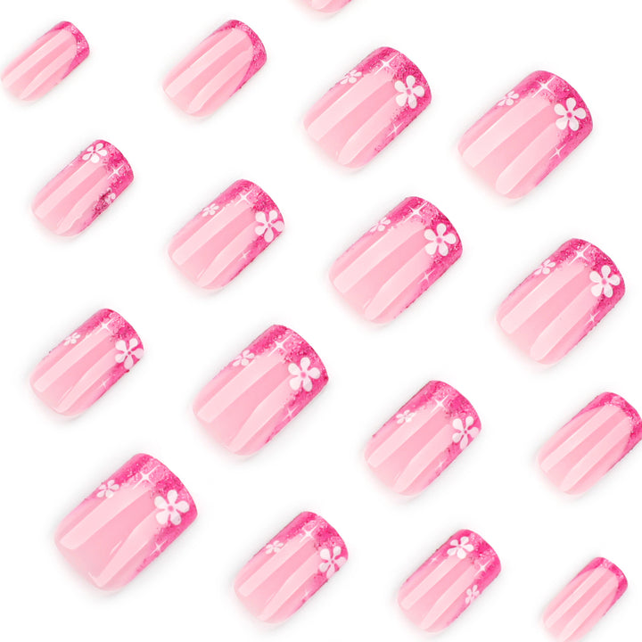 Artistic nail art with floral accent and glitter Kalsten