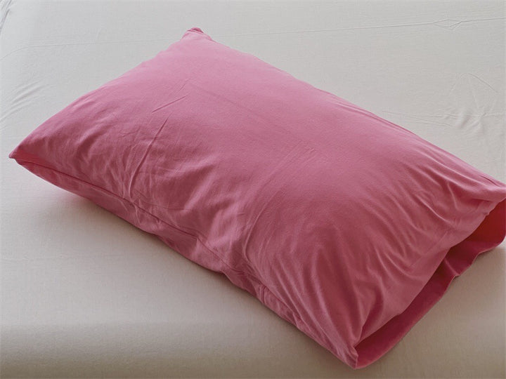 Comfort pillow with breathable cover and shape-retaining filling