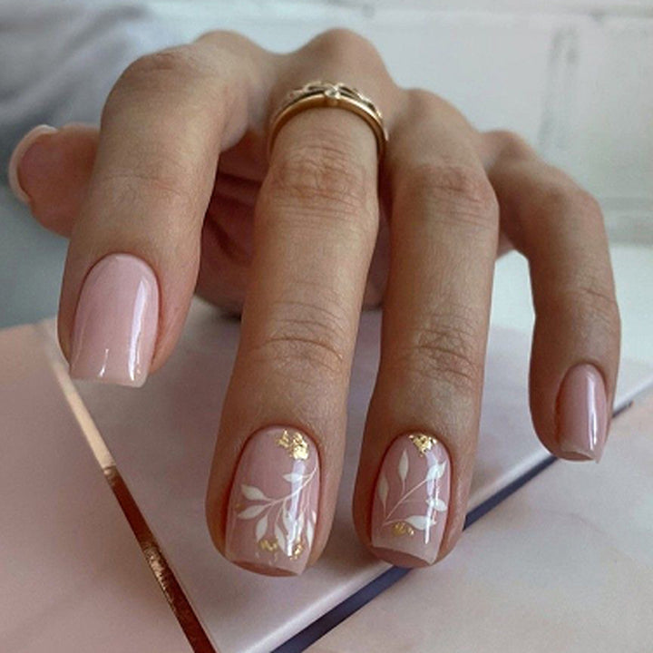 Artful nail art with elegant floral design Kalsten