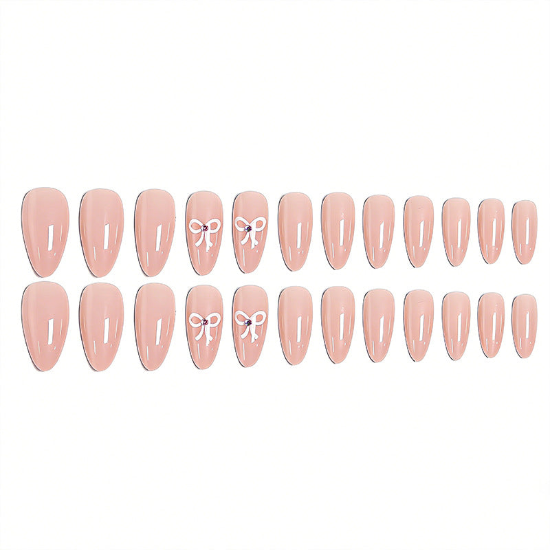 Acrylic nail set with elegant bow accents Kalsten