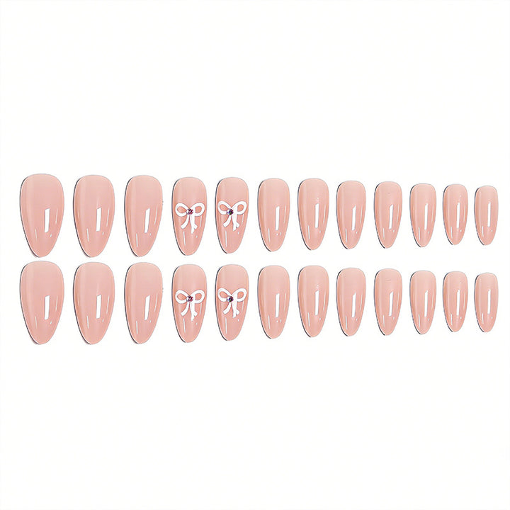 Acrylic nail set with elegant bow accents Kalsten
