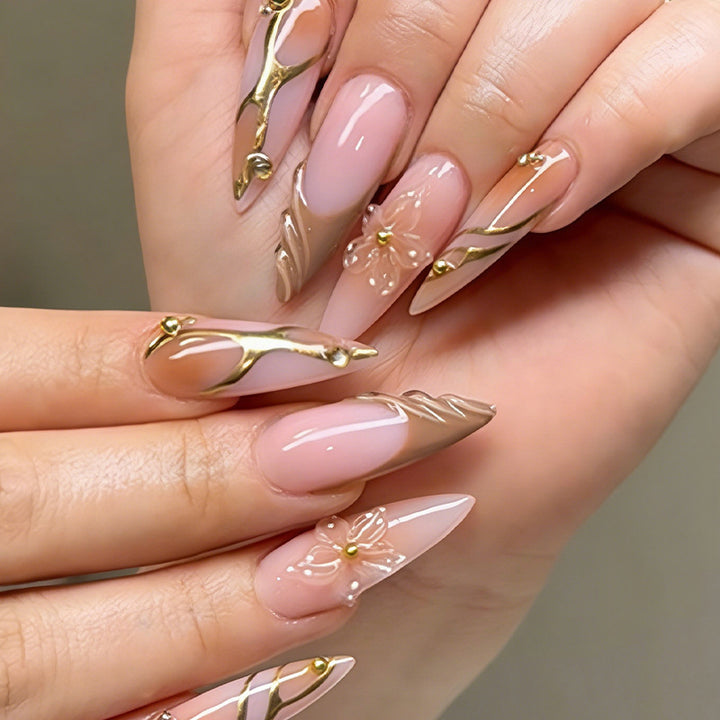 Nail art set with floral designs and glitter accents Kalsten